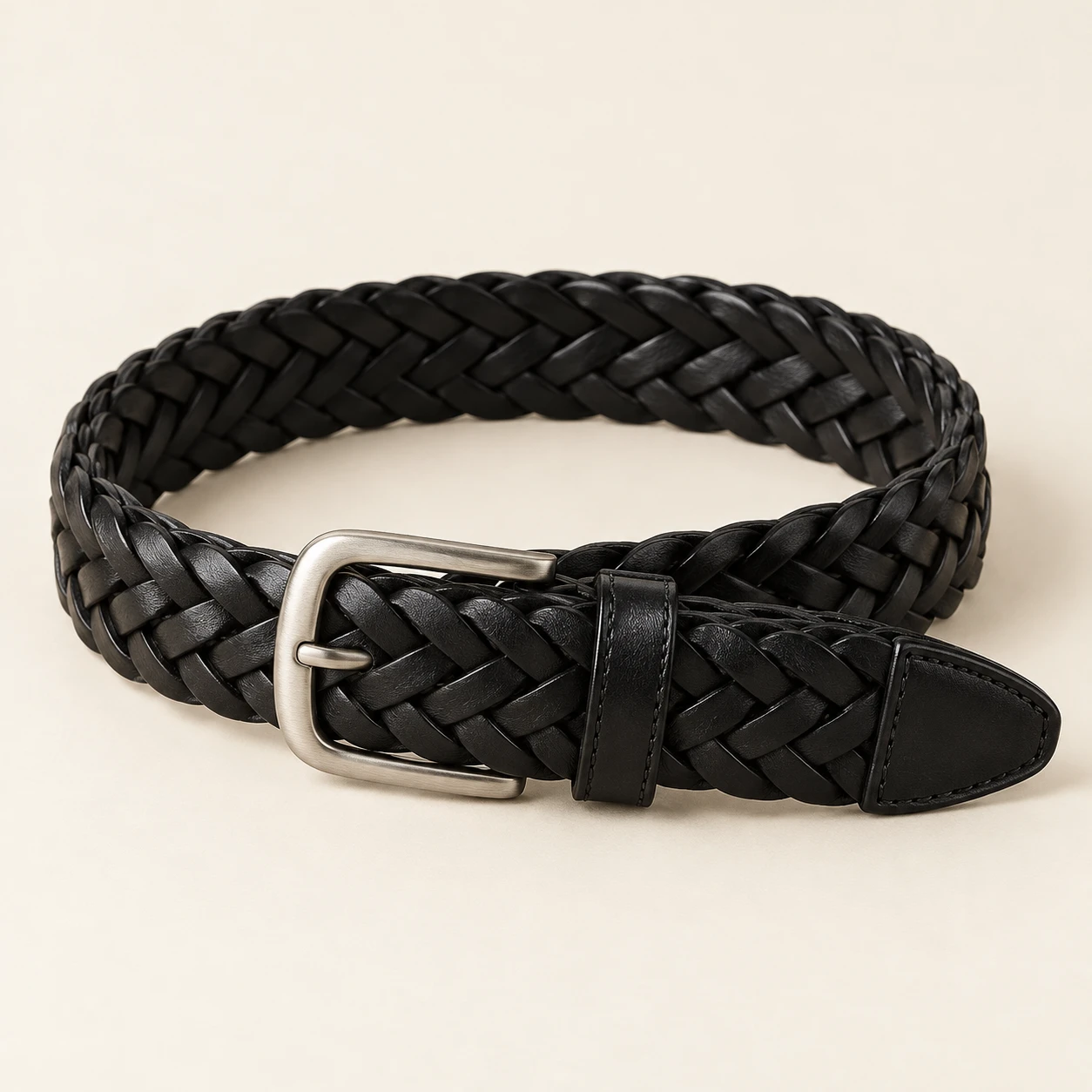 Black Lucca Black Braided Belt — Nonelastic interwoven leather strips with solid leather tip and keeper; no punched holes
