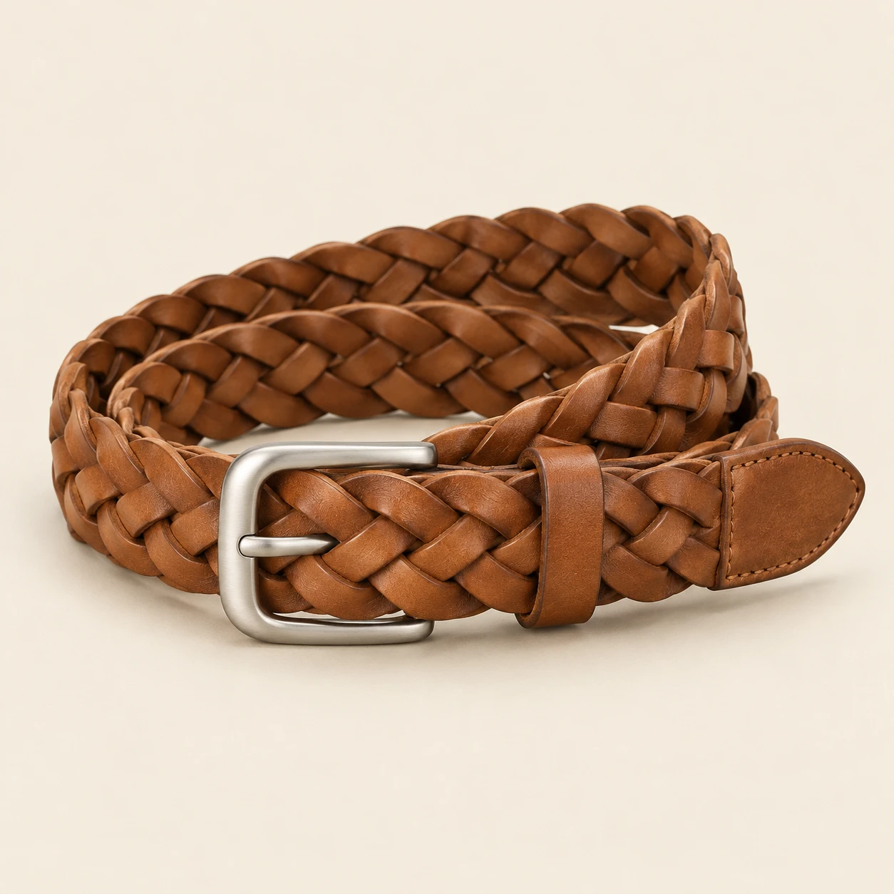 Tan Siena Tan Braided Belt — Nonelastic interwoven leather strips with solid leather tip and keeper; no punched holes